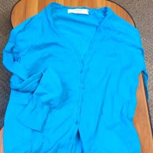 Bright blue cardigan